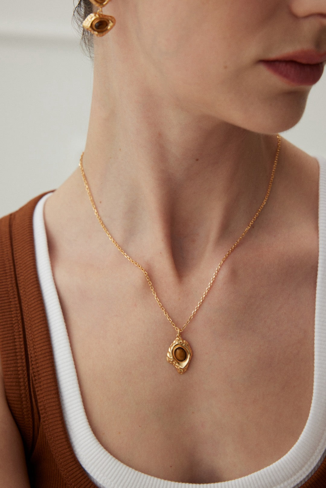 Golden Gaze Pendant Necklace